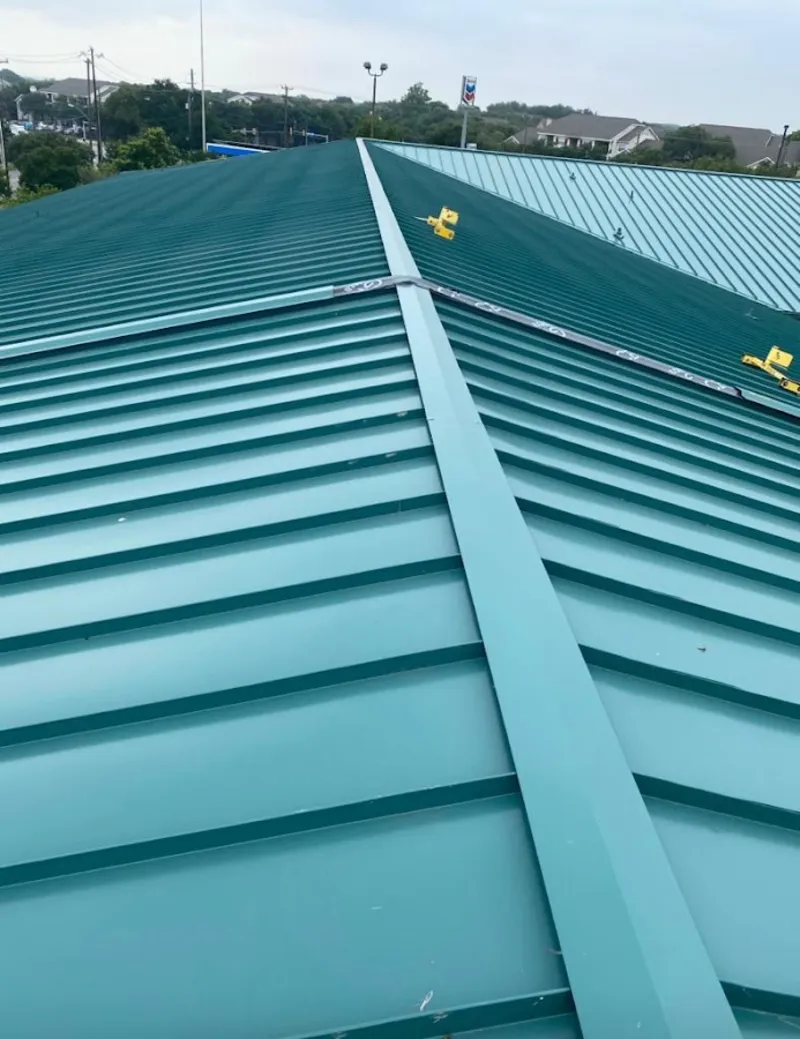 Green commercial metal roof ridge and valley for Metal Roof Repair in Oscoda